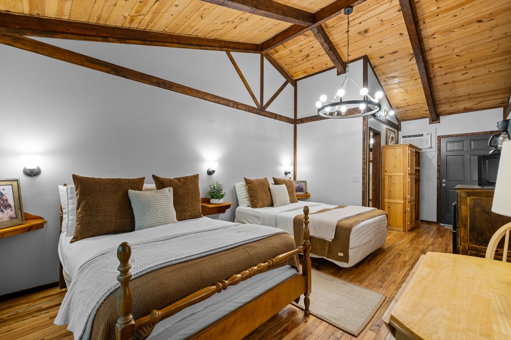 3573 Highway 356 Sautee Nacoochee, GA 30571 - Photo 47 of 53 a bedroom with a bed a couch and chair