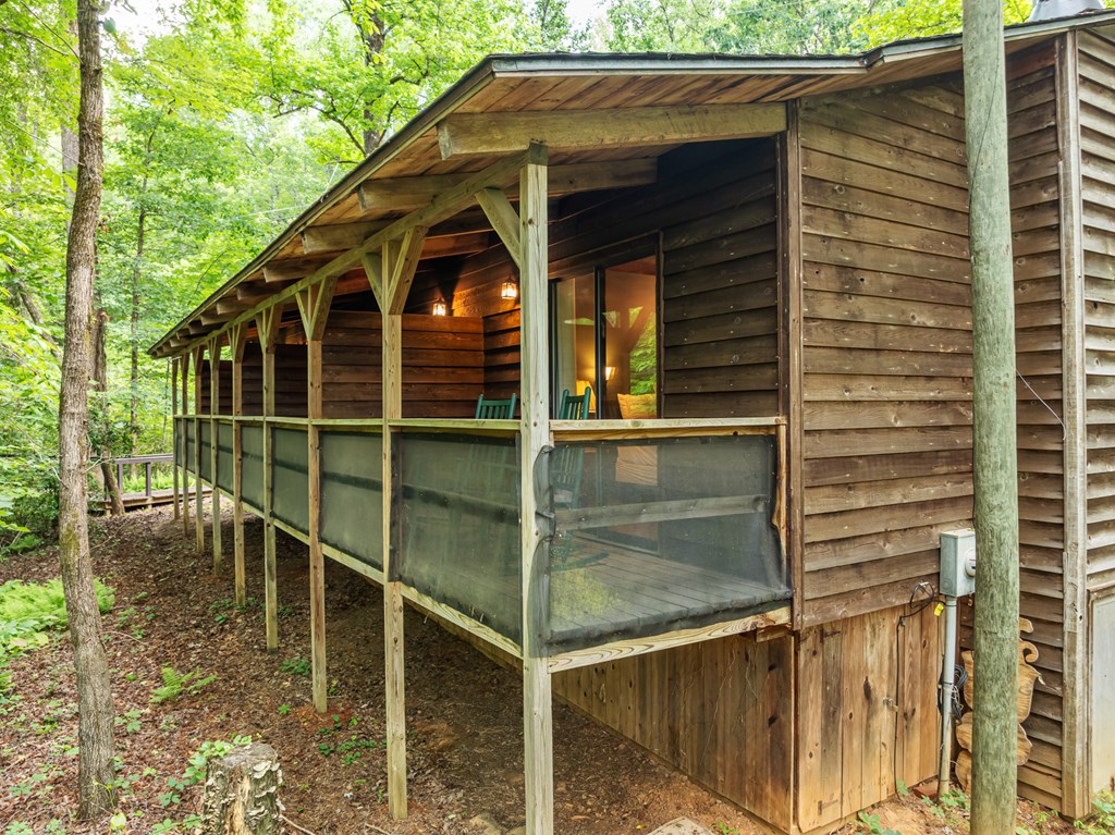 3573 Highway 356 Sautee Nacoochee, GA 30571 - Photo 7 of 53 a backyard of a house with lots of green space