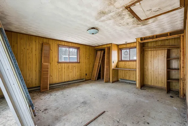 a kitchen with stainless steel appliances granite countertop a sink and a stove
