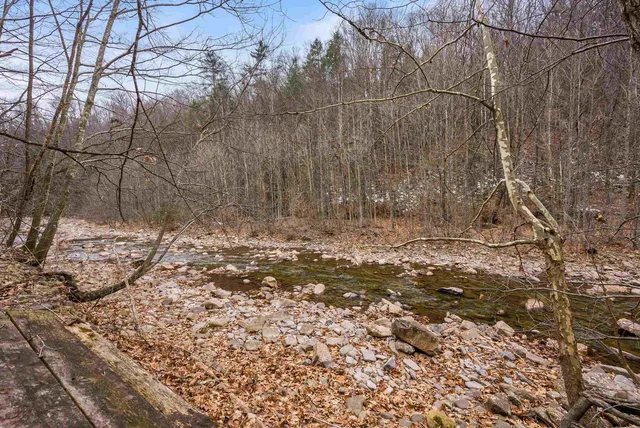a view of house with a street