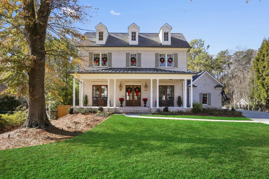 2862 Redding Road Northeast Brookhaven, GA 30319 - Photo 1 of 1 Sitting back from the street and on a gorgeous estate lot, this 4 sided brick custom home stands out from the front porch and curb appeal all the way through. Fully landscaped + landscape lighting & irrigation system.