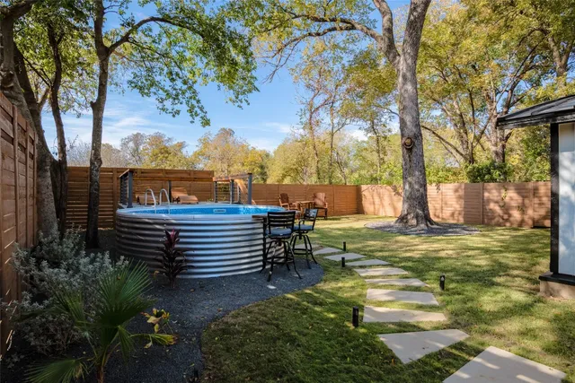 a view of a bench in a garden