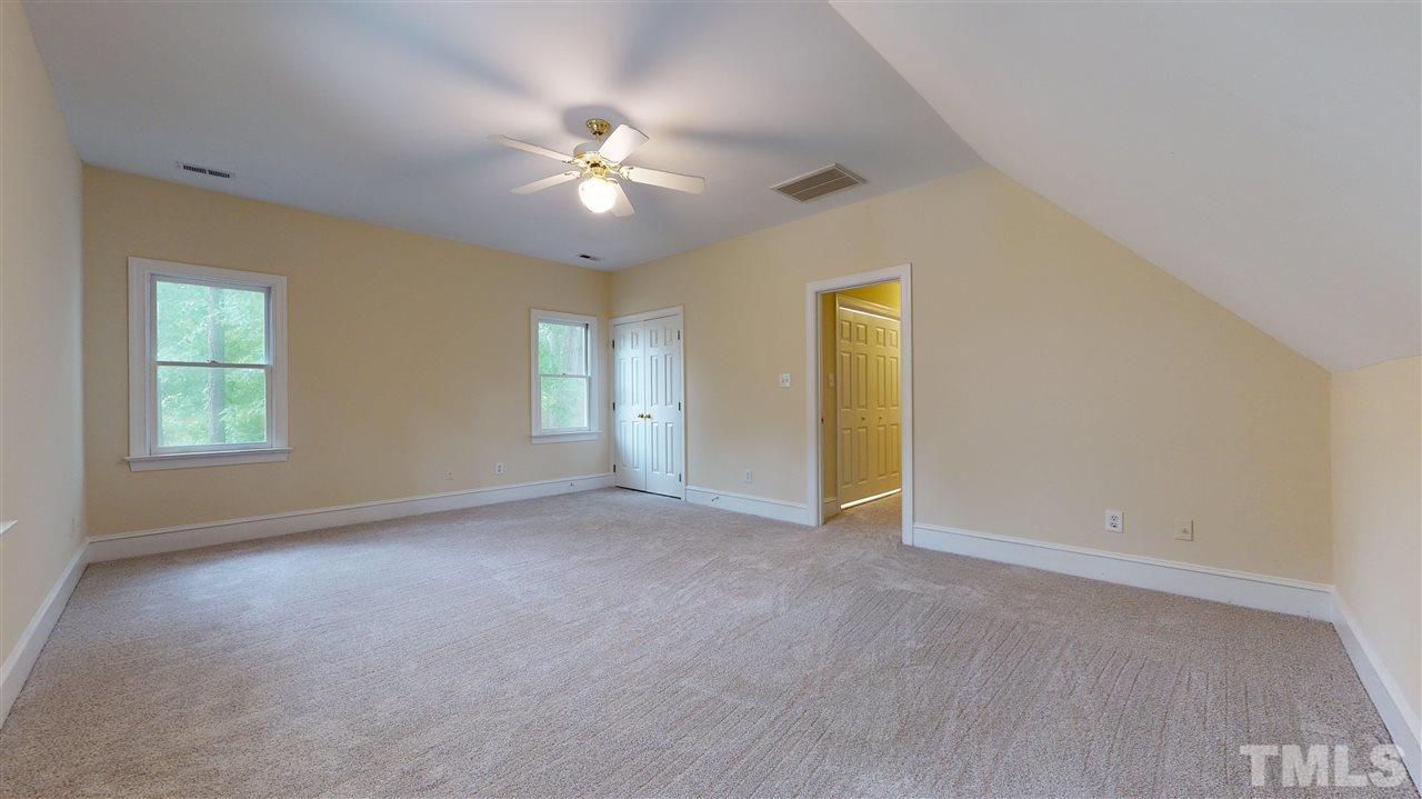 9509 Brimstone Lane Raleigh, NC 27613 - Photo 20 of 30 Bedroom/Bonus is very spacious, has double closet and tons of windows. New carpet.
