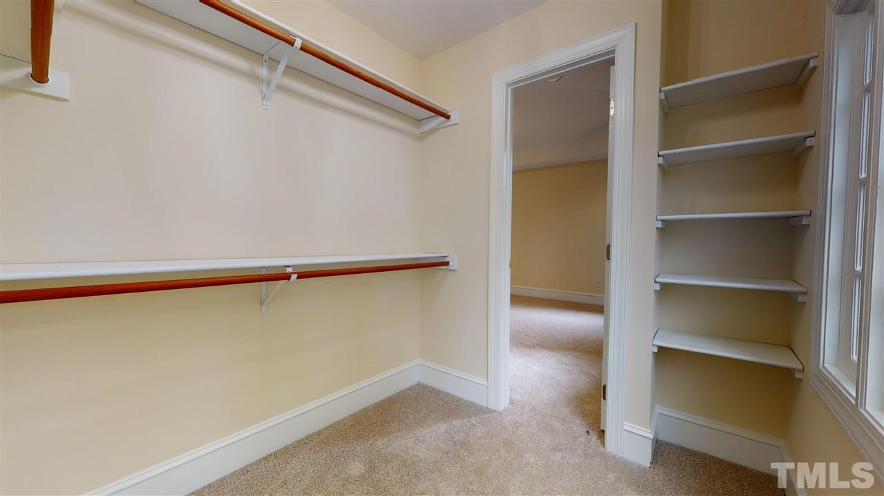 9509 Brimstone Lane Raleigh, NC 27613 - Photo 24 of 30 Walk In closet located in Master Bedroom.
