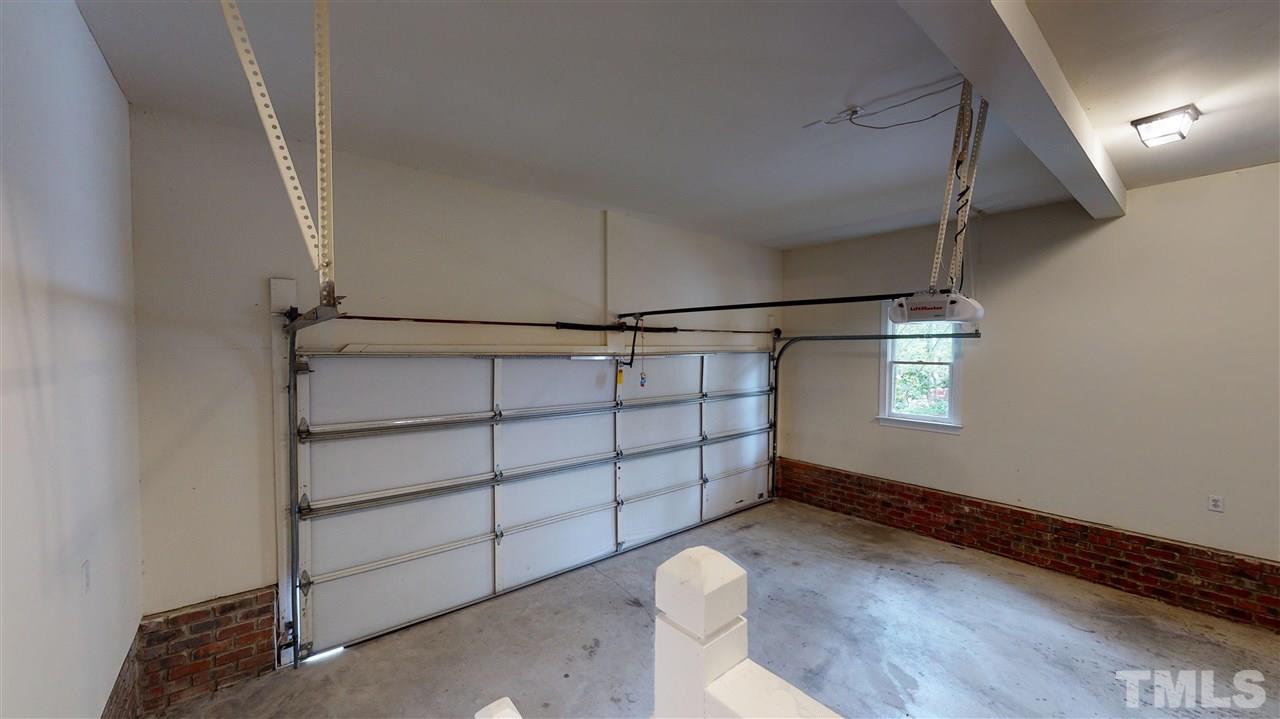 9509 Brimstone Lane Raleigh, NC 27613 - Photo 29 of 30 2 car Garage is very spacious. Door to enter house is located in the kitchen. i