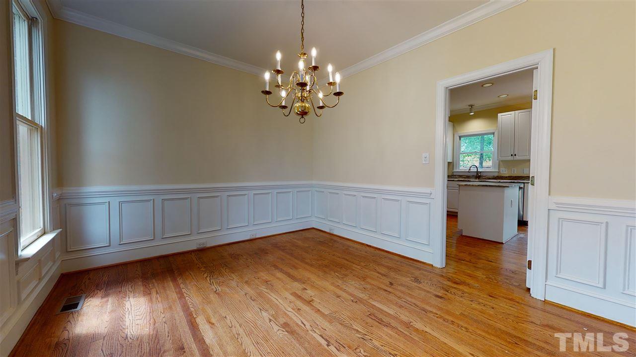 9509 Brimstone Lane Raleigh, NC 27613 - Photo 5 of 30 Formal Dining Room has cased opening to kitchen and breakfast room.