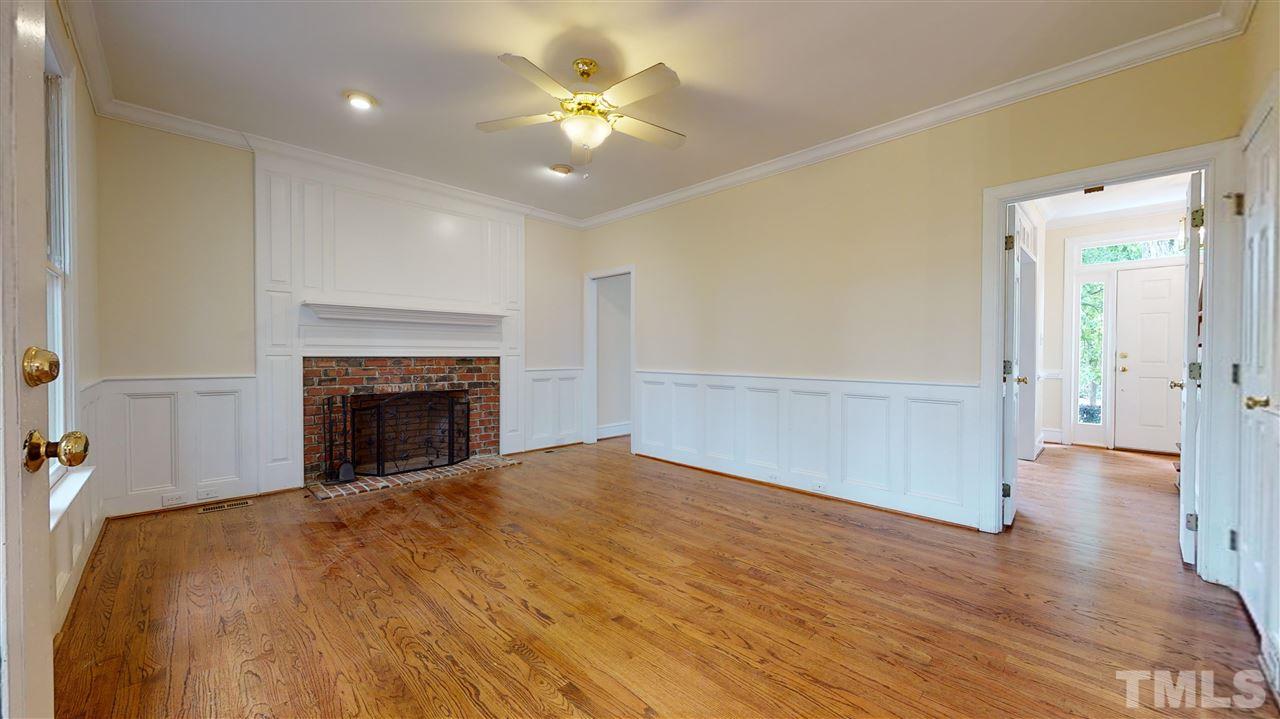 9509 Brimstone Lane Raleigh, NC 27613 - Photo 9 of 30 Family Room is located on the back of the house and is open to the kitchen and breakfast room. Double doors to Foyer can be closed from front of house for privacy.