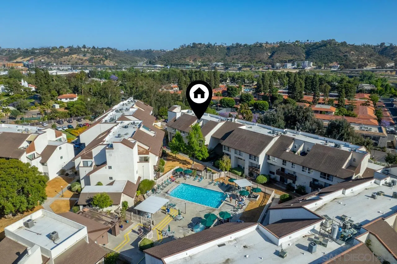 6191 Rancho Mission Road, Unit 308 San Diego, CA 92108 - Photo 25 of 31 an aerial view of residential houses with outdoor space
