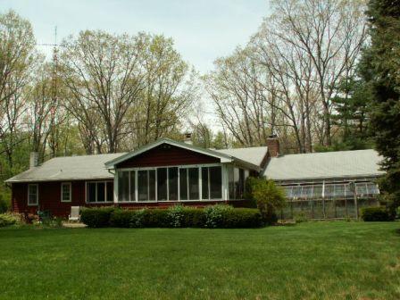 437 Smith Road Kunkletown, PA 18058 - Photo 5 of 13 a front view of a house with a garden