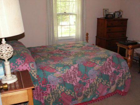 437 Smith Road Kunkletown, PA 18058 - Photo 9 of 13 a bedroom with a bed and a window