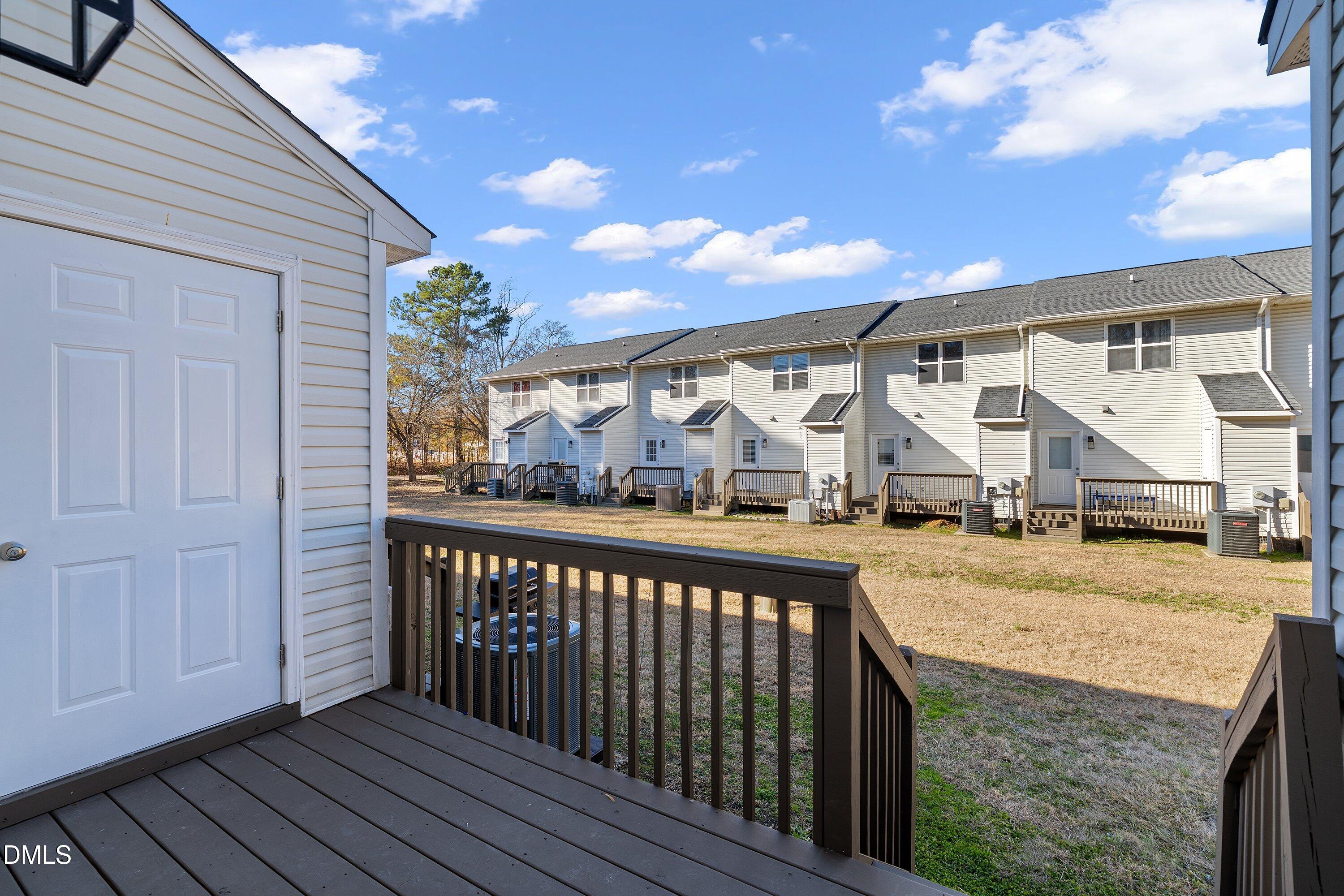 389 East Williams Street Angier, NC 27501 - Photo 22 of 26 a view of a house with a porch