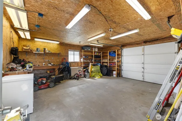 a view of a garage with storage