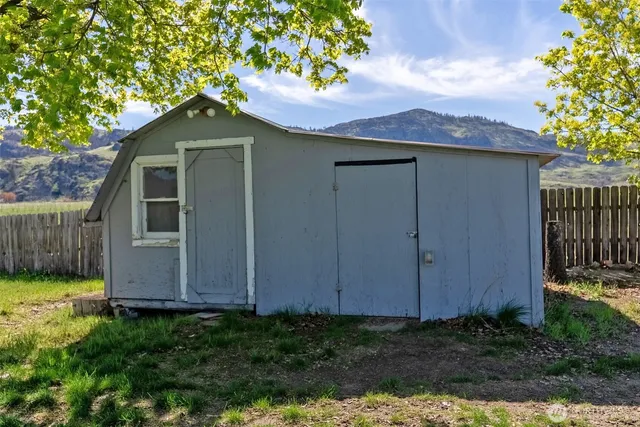 a house with trees in the background