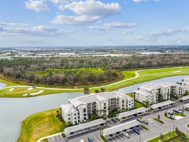 an aerial view of a house with outdoor space