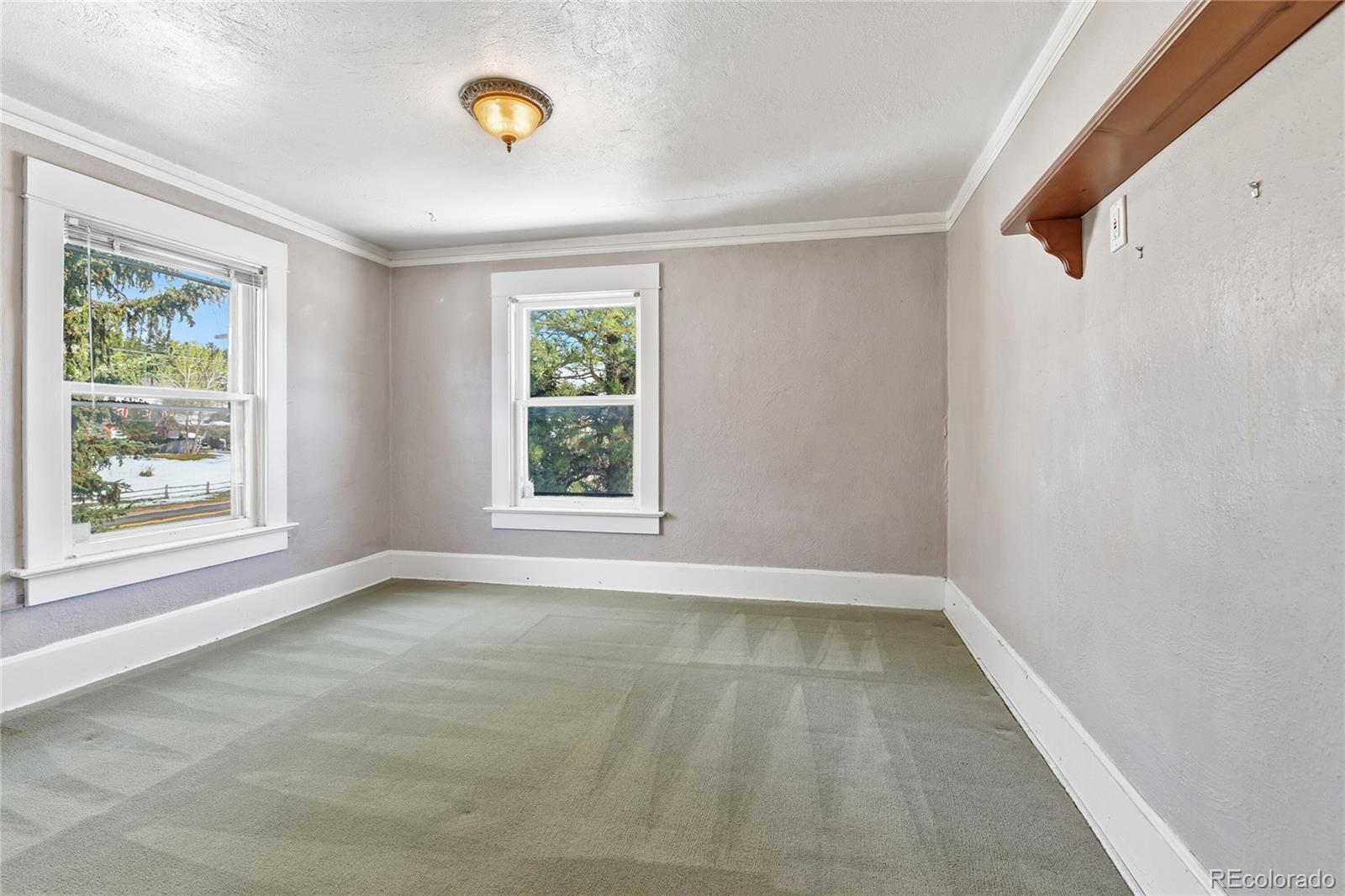 9490 Spruce Mountain Road Larkspur, CO 80118 - Photo 34 of 49 a view of a room that has a window