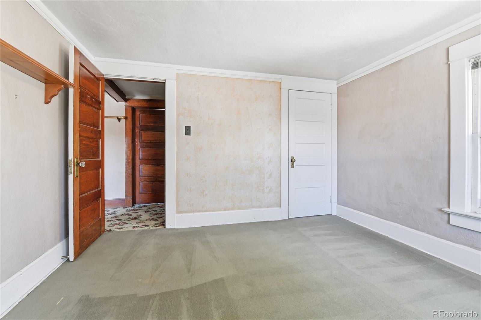 9490 Spruce Mountain Road Larkspur, CO 80118 - Photo 35 of 49 a view of an empty room