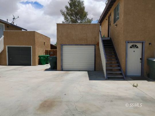 712 North Florence Street Ridgecrest, CA 93555 - Photo 4 of 14 a view of a house with a garage