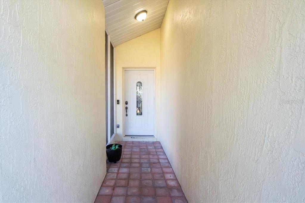 7264 Lindhurst Street Spring Hill, FL 34606 - Photo 5 of 24 a view of a bathroom with a shower