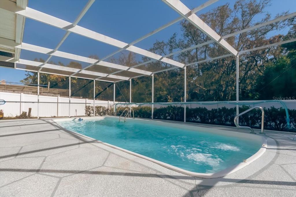 7264 Lindhurst Street Spring Hill, FL 34606 - Photo 10 of 24 a view of a backyard