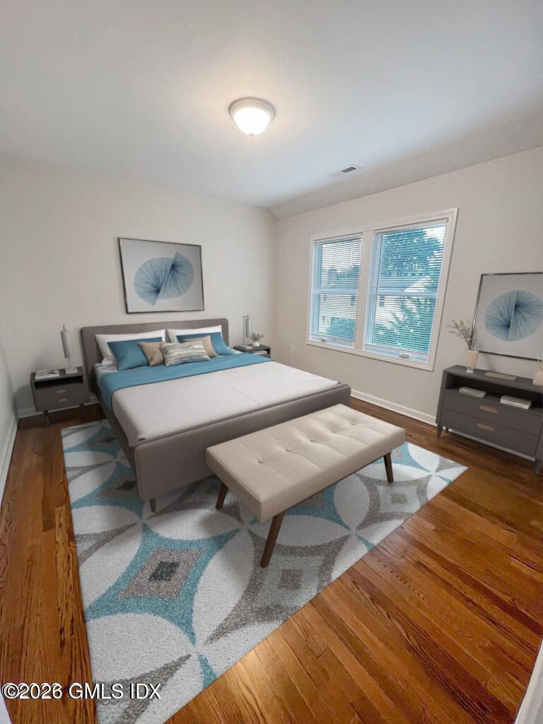 19 Bible Street, Unit 2 Cos Cob, CT 06807 - Photo 15 of 26 a living room with furniture and a table