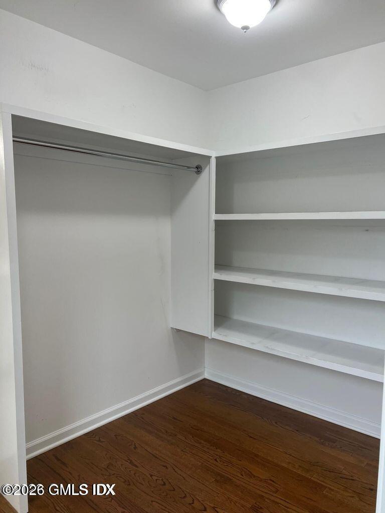 19 Bible Street, Unit 2 Cos Cob, CT 06807 - Photo 17 of 26 a view of a room with empty racks