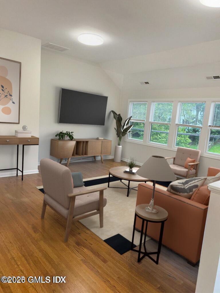 19 Bible Street, Unit 2 Cos Cob, CT 06807 - Photo 5 of 26 a living room with furniture and a flat screen tv
