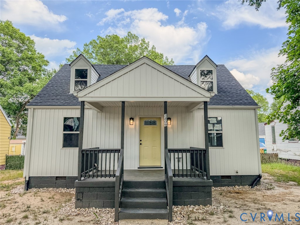 3409 Meadowbridge Road Richmond, VA 23222 - Photo 1 of 32 a front view of a house with garden