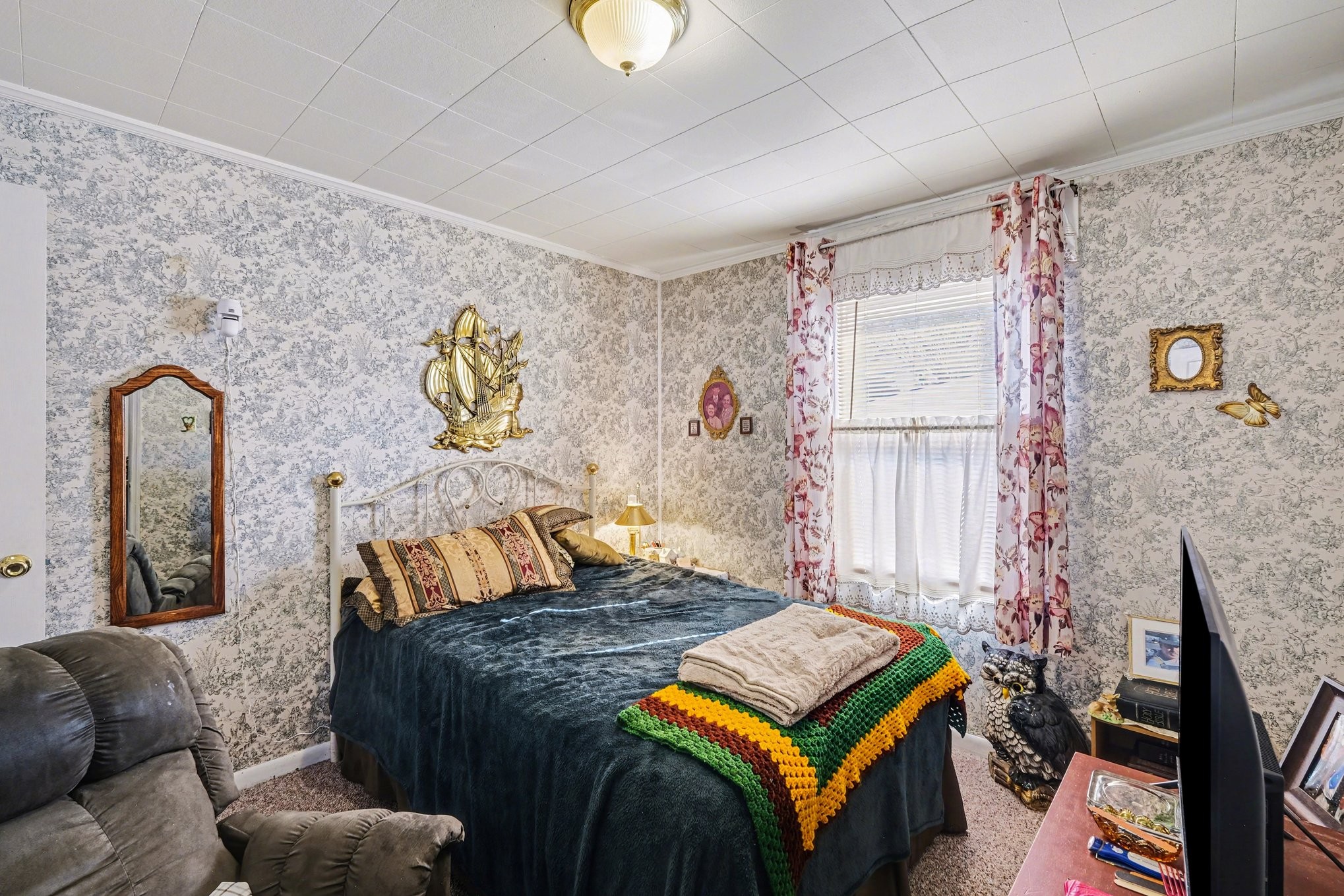 1801 Scribner Avenue Columbia, TN 38401 - Photo 16 of 30 a bedroom with a bed and wooden floor