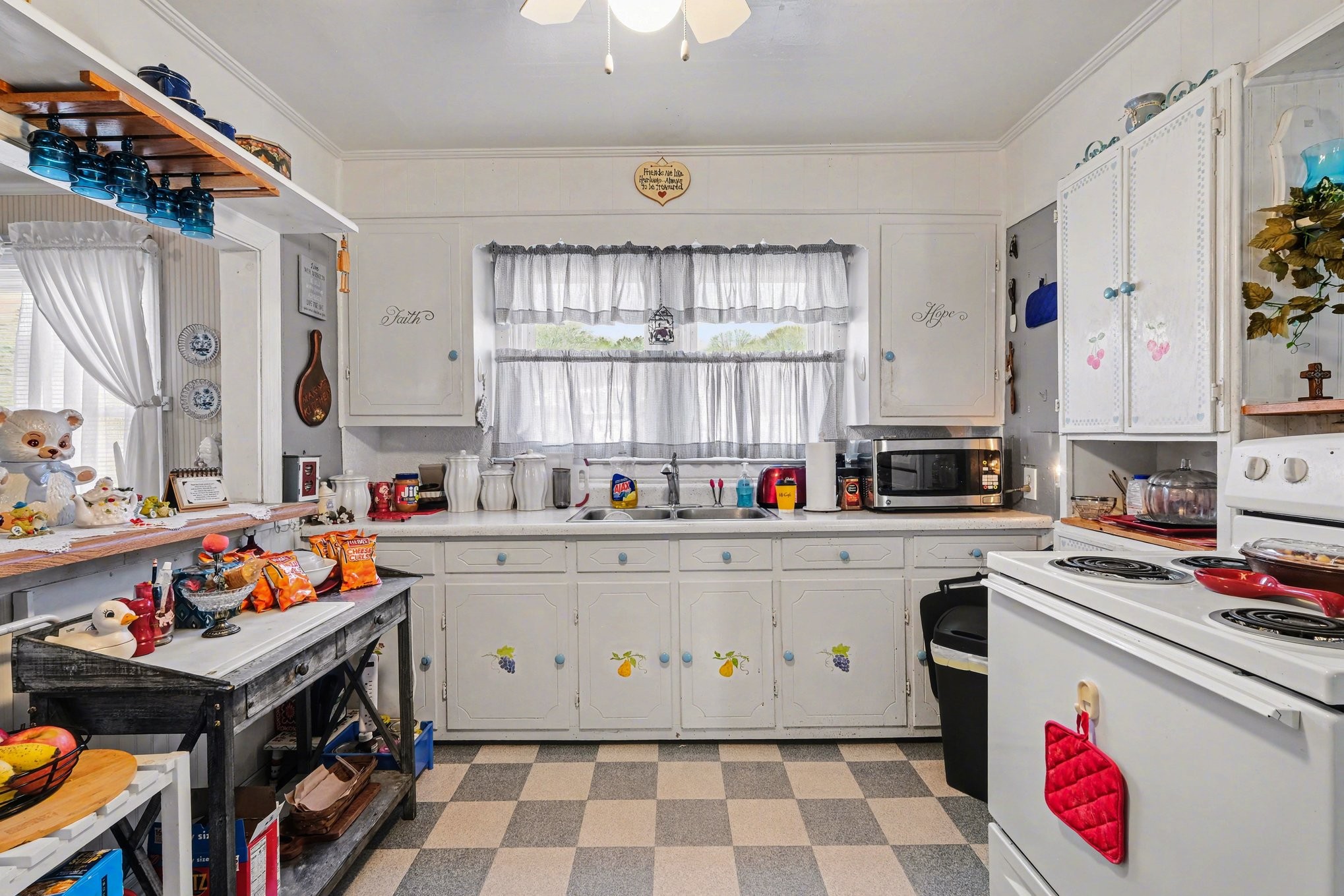 1801 Scribner Avenue Columbia, TN 38401 - Photo 10 of 30 a kitchen with stainless steel appliances a stove a sink and a refrigerator