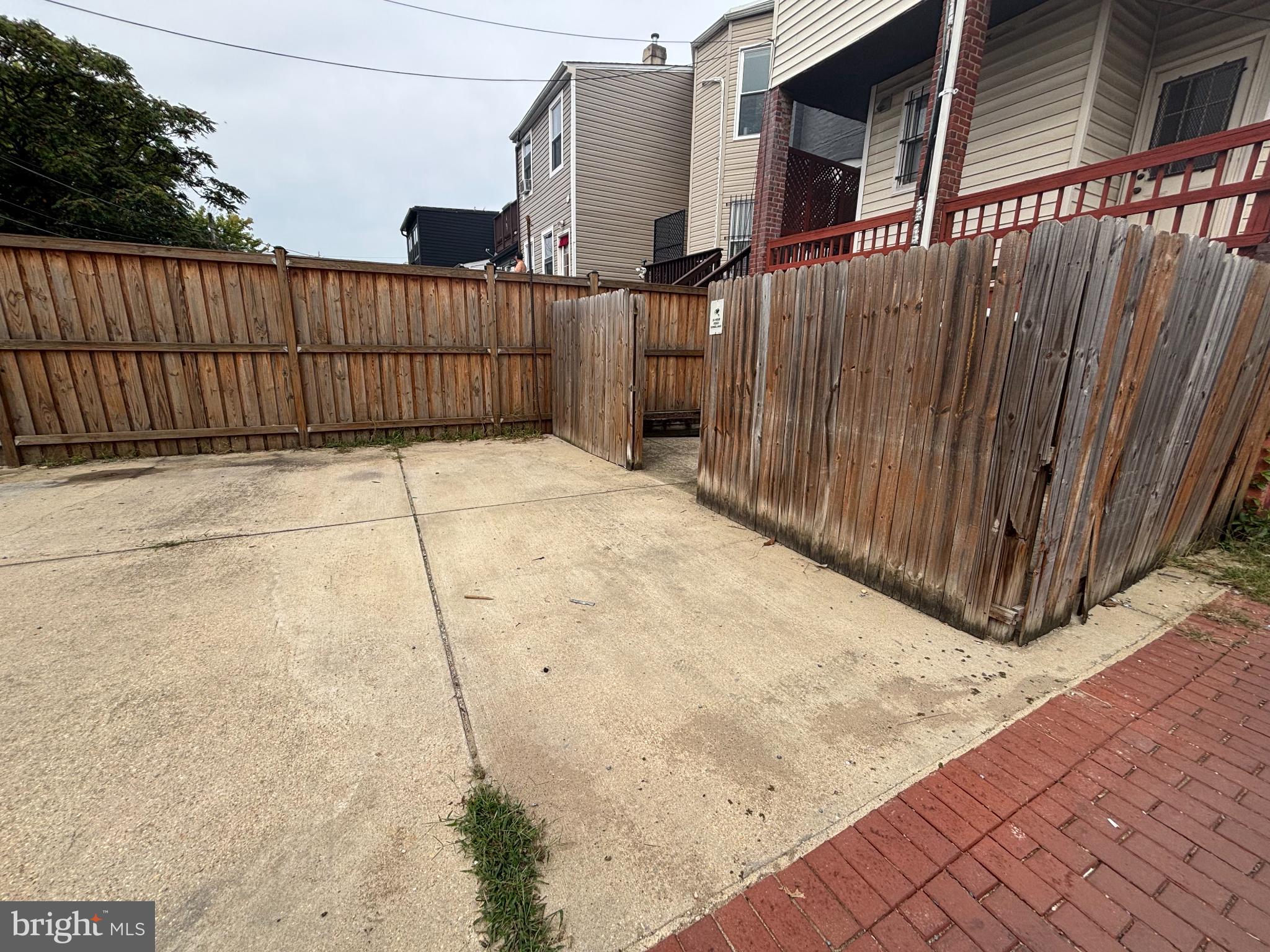 600 Keefer Place Northwest, Unit 1 Washington, DC 20010 - Photo 12 of 15 a view of a backyard with wooden fence