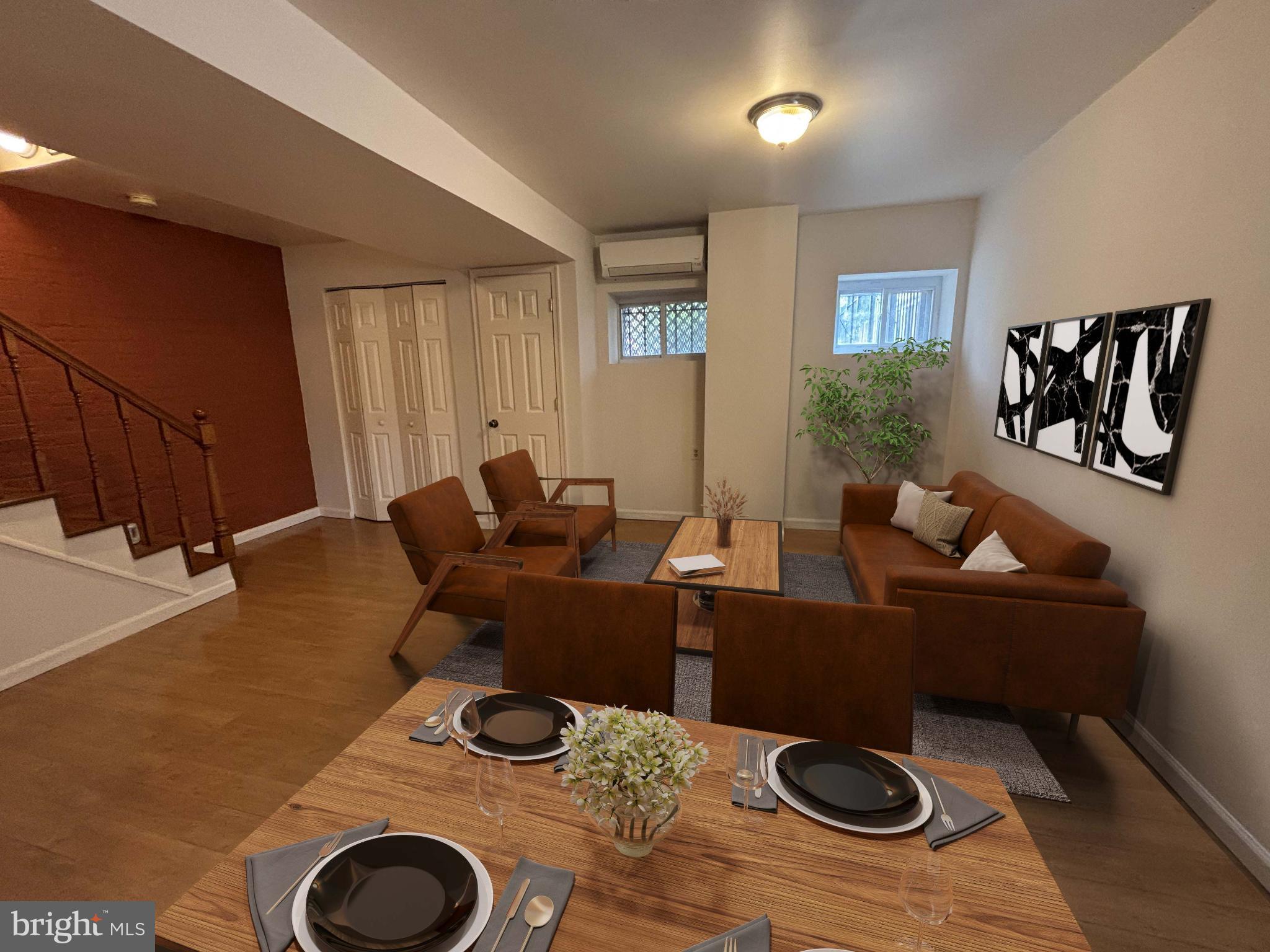 600 Keefer Place Northwest, Unit 1 Washington, DC 20010 - Photo 2 of 14 a living room with furniture and a rug