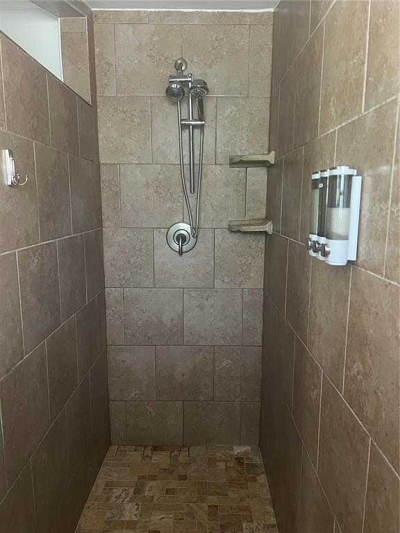 7650 Northeast 40th Street High Springs, FL 32643 - Photo 23 of 75 a bathroom with a shower