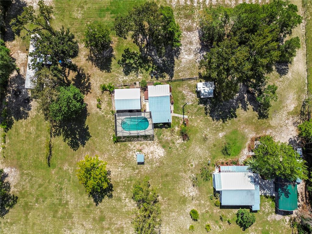 7650 Northeast 40th Street High Springs, FL 32643 - Photo 27 of 75 an aerial view of a house with a yard