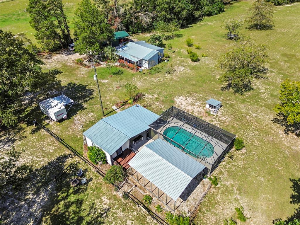 7650 Northeast 40th Street High Springs, FL 32643 - Photo 28 of 75 an aerial view of a house with a yard