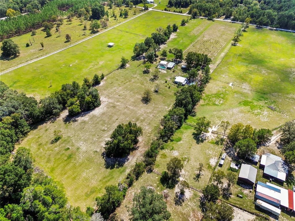 7650 Northeast 40th Street High Springs, FL 32643 - Photo 34 of 75 a view of a lake with a yard