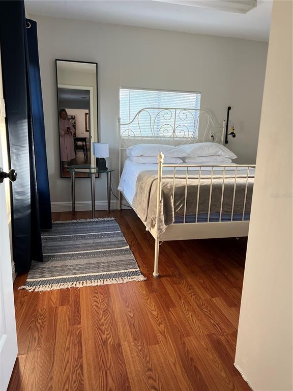 7650 Northeast 40th Street High Springs, FL 32643 - Photo 51 of 75 a bedroom with a bed and a table