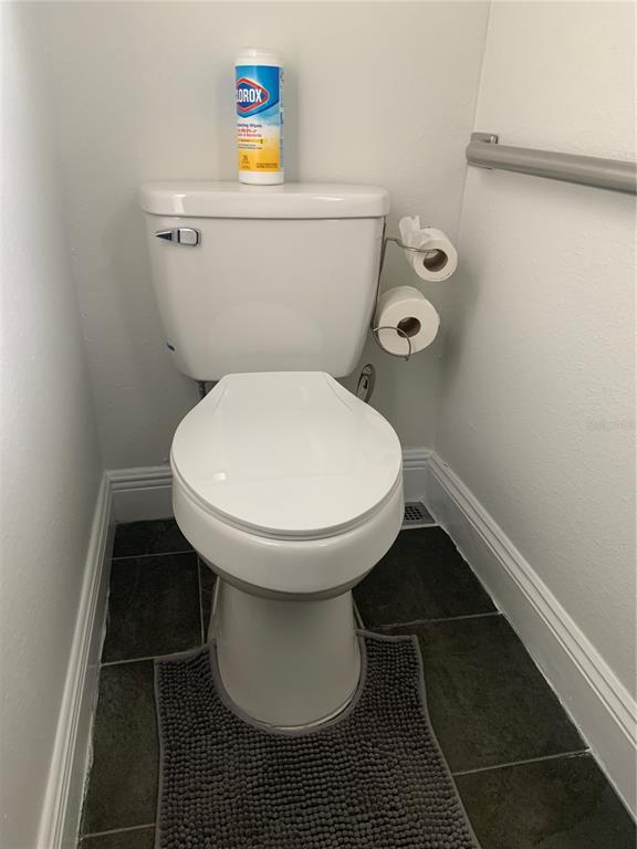 7650 Northeast 40th Street High Springs, FL 32643 - Photo 54 of 75 a bathroom with a toilet and a sink