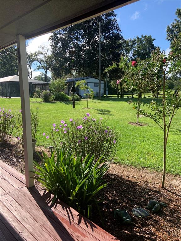 7650 Northeast 40th Street High Springs, FL 32643 - Photo 58 of 75 a view of a garden with an outdoor space
