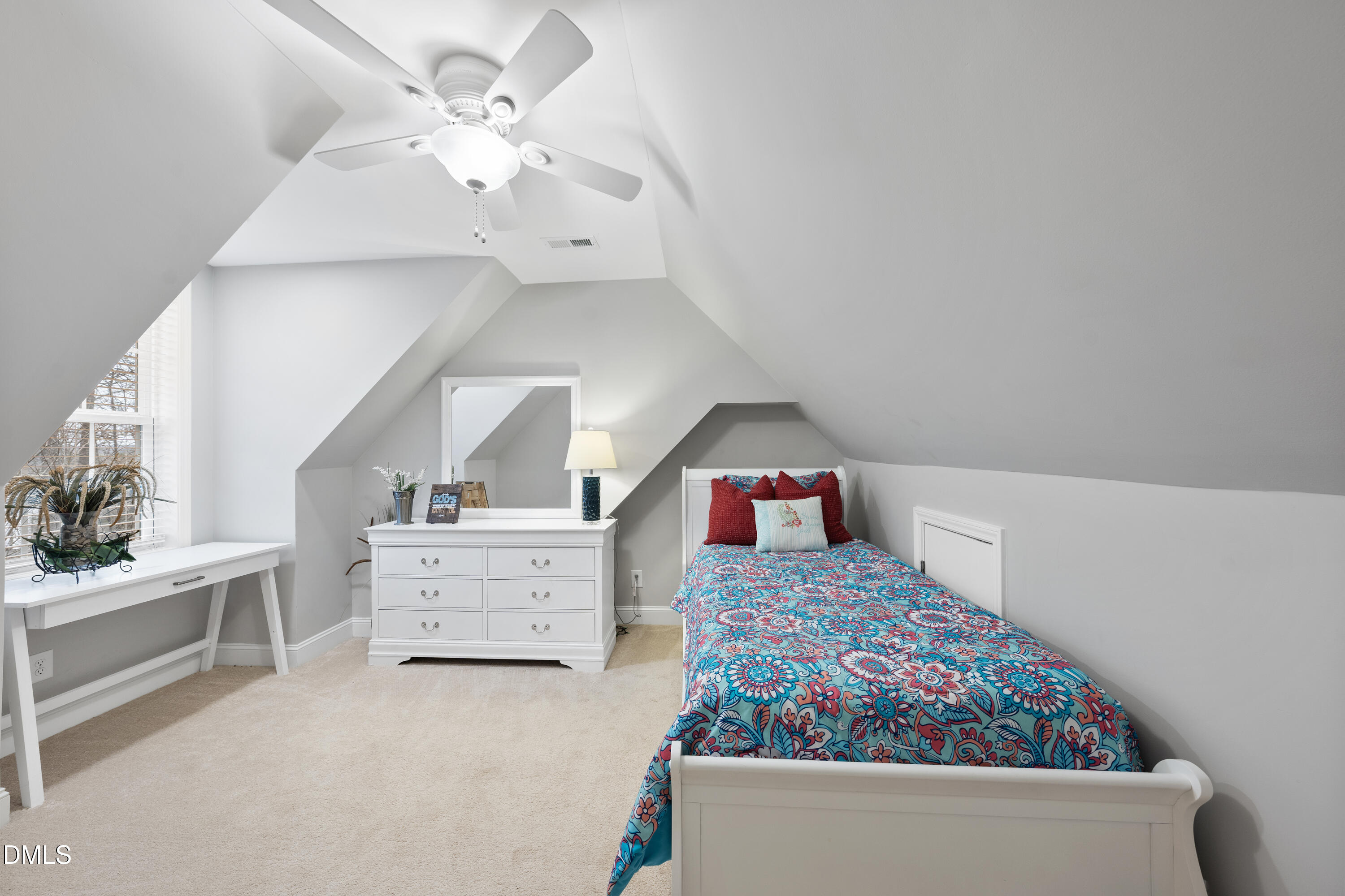 1121 Osmond Road Leasburg, NC 27291 - Photo 25 of 39 a living room with furniture and a dresser