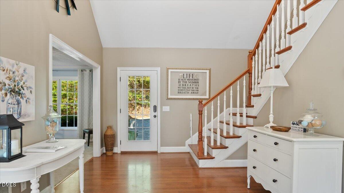 1121 Osmond Road Leasburg, NC 27291 - Photo 7 of 39 a view of entryway and hall with wooden floor