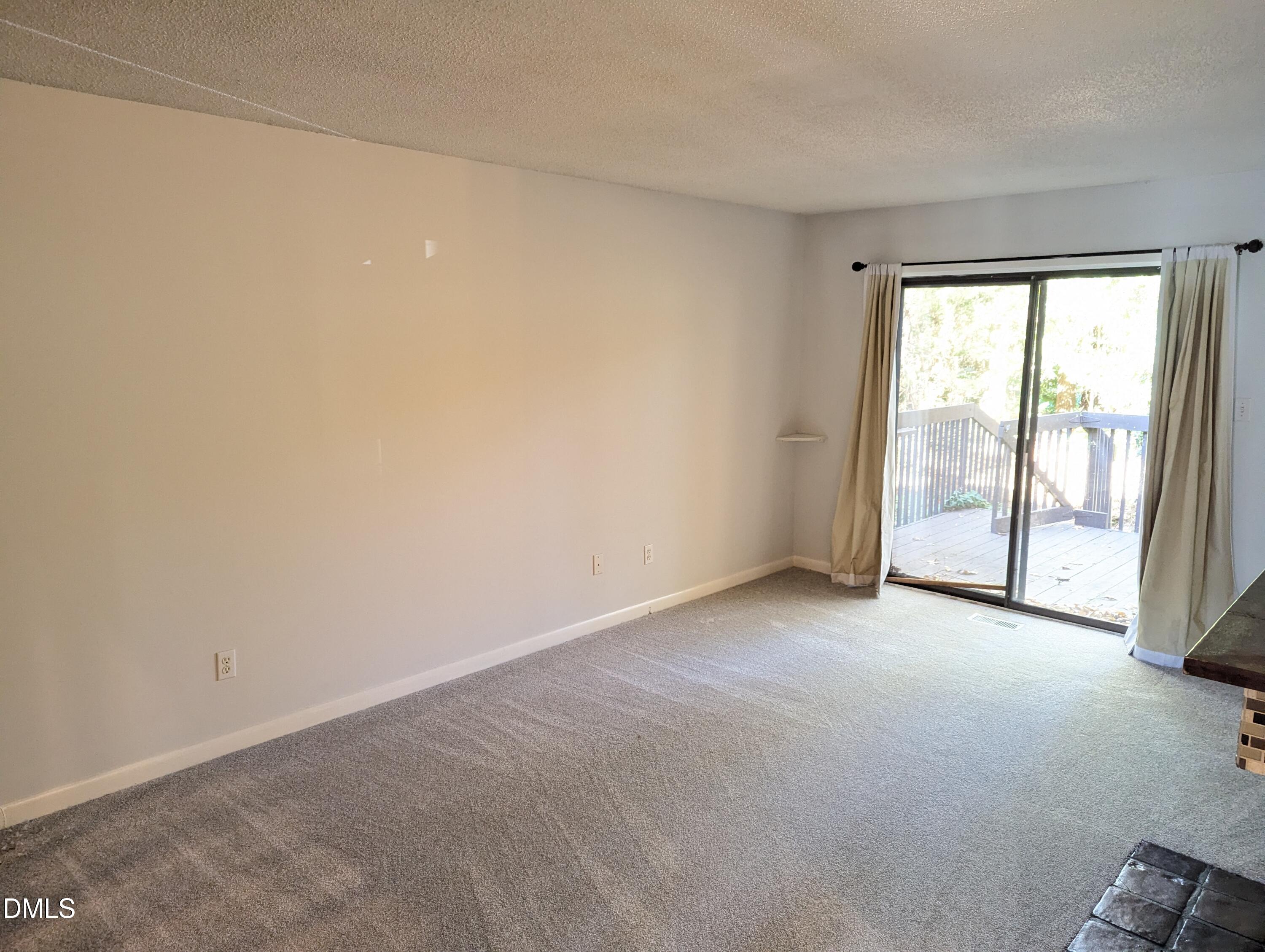 4100 Five Oaks Drive, Unit 49 Durham, NC 27707 - Photo 14 of 23 a view of an empty room with window