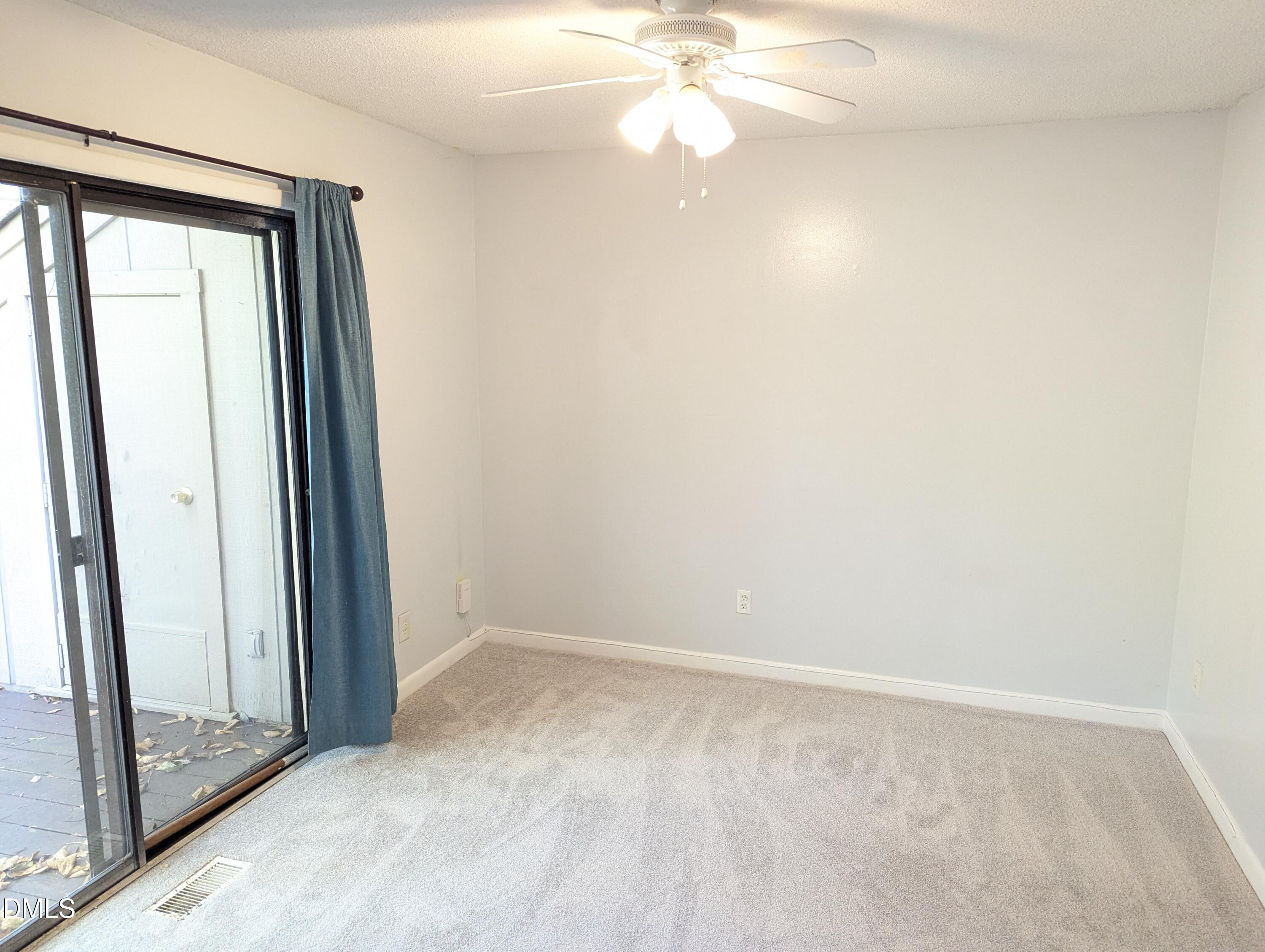 4100 Five Oaks Drive, Unit 49 Durham, NC 27707 - Photo 15 of 23 an empty room with a mirror