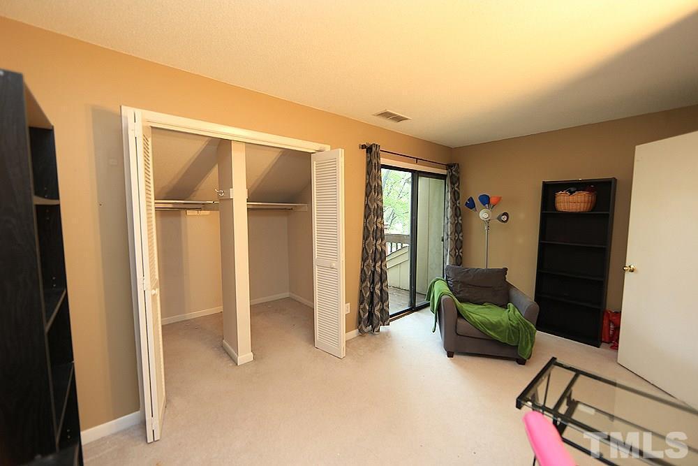 4100 Five Oaks Drive, Unit 49 Durham, NC 27707 - Photo 17 of 23 a view of livingroom with furniture and windows