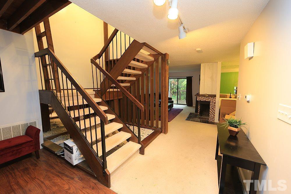 4100 Five Oaks Drive, Unit 49 Durham, NC 27707 - Photo 3 of 23 a view of entryway and hall with wooden floor