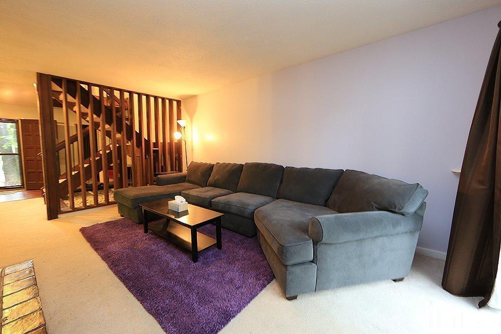 4100 Five Oaks Drive, Unit 49 Durham, NC 27707 - Photo 10 of 23 a living room with furniture and a rug