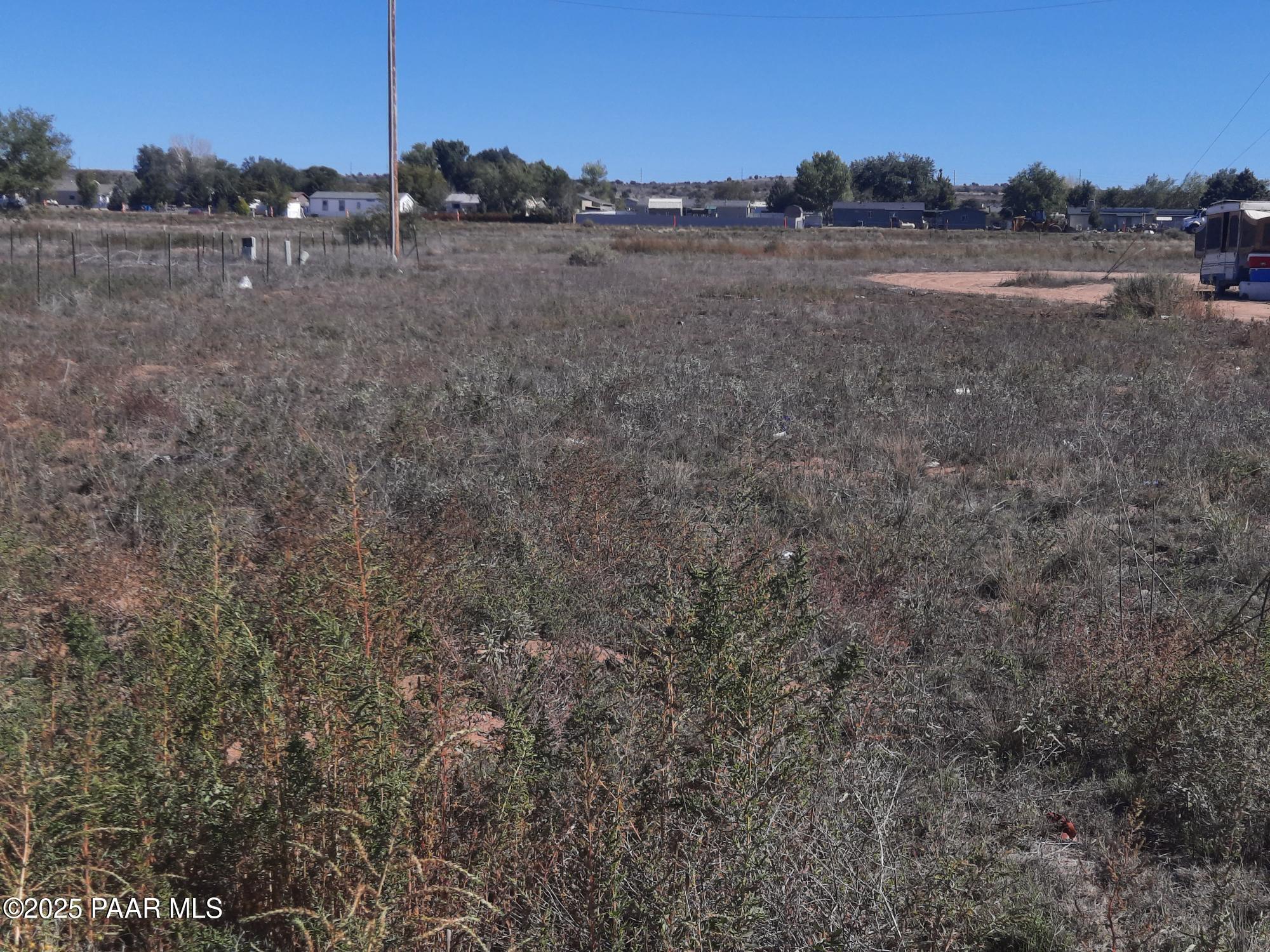 24255 North Riviera Avenue Paulden, AZ 86334 - Photo 2 of 5 a view of dirt field and trees