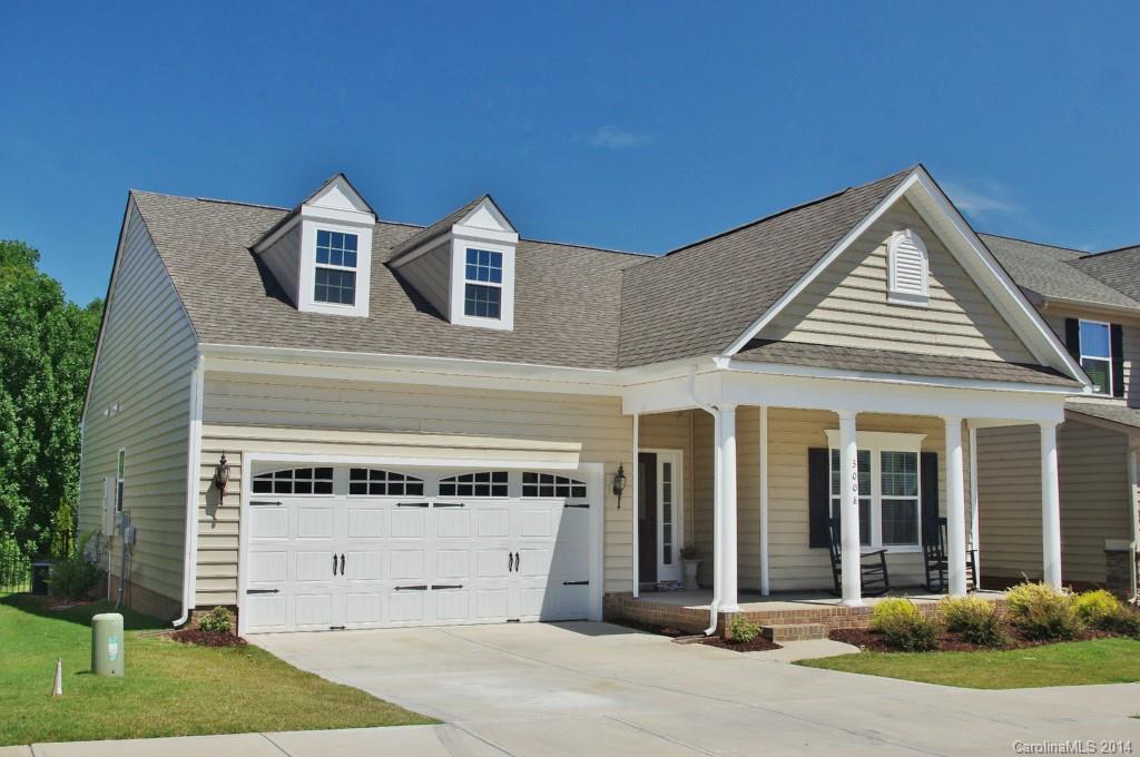3008 Fallondale Road Waxhaw, NC 28173 - Photo 1 of 23 a view of a white house with a small yard and large tree