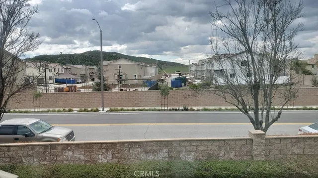 a view of a water fountain in front of a building