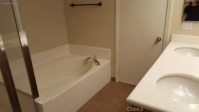 a bathroom with a sink and a bathtub