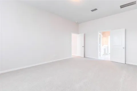 a bathroom with a double vanity sink a mirror and a shower